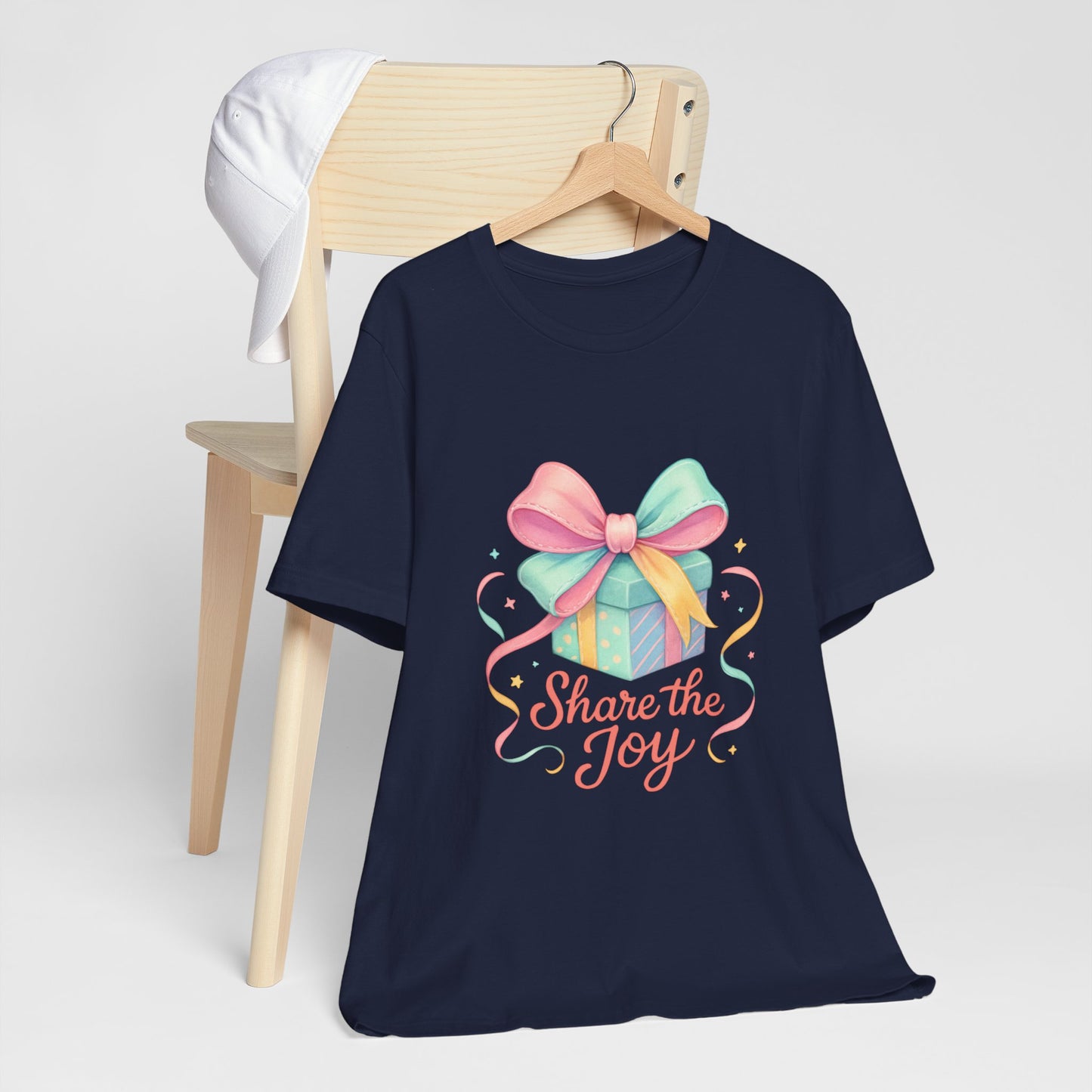 Share the Joy Gift Tee — Pastel Present Graphic T-Shirt Printify