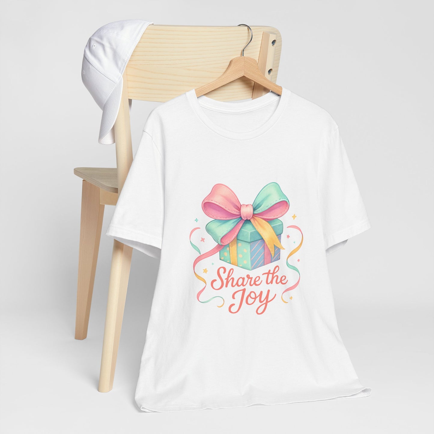 Share the Joy Gift Tee — Pastel Present Graphic T-Shirt Printify